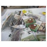 BOX LOT: L-TO-R: TABS, BRAIDED BOW STRINGS, BOW...
