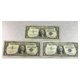 (3) 1957 series $1 US silver certificate