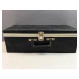 vintage 8-track tapes housed in a black vinyl