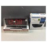 (2) digital alarm clocks