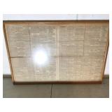 framed newspaper page
