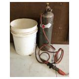 gas tank, torch and bucket