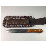 Kitchen knife with handmade leather cover