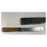 Vintage kitchen knife with handmade leather cover
