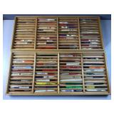 Advertising pens in 2 display cases