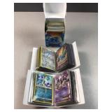 Loose Pokï¿½mon cards and energy cards