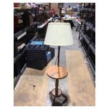 Wooden night stand with lamp