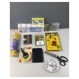 Staples, tape, book light, tags, rope, scissors,