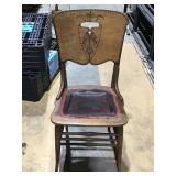 Wooden chair with leather cushion