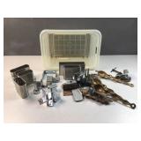 Metal brackets with other hardware and plastic tub