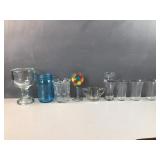 Glass blue jar and varied glasses