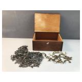 Wooden latched box with chains and hooks