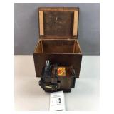 Wooden box with pinhole photographer and guide