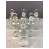 set of 6 glass sciecen bottles w stopper