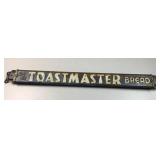 Antique Toastmaster Bread advertising sign