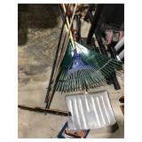 2 rakes squeegee and shovel