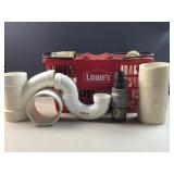 Lowes shopping basket full of plumbing pieces