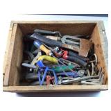 Wood crate of yard tools