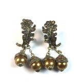 Heidi Daus brown and gold acorn earrings with