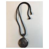 QVC sterling silver disc pendant on black silk