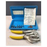 Hand punch in original tool case