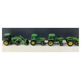 (4) John Deere Collectible miniature tractors