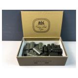 Cigar box of green Army trucks / vehicles