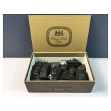 Cigar box of green Army trucks / vehicles