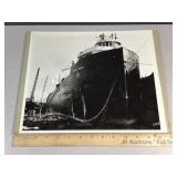 Black n White image of docked ship