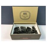 Cigar box of green Army trucks / vehicles