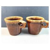 pair Hulls toneware coffee mugs