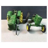Two Vintage John Deere Toy Tractors