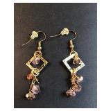 Gold tone geometric dangle earrings with lavender