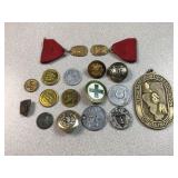 assortment of pind and medals