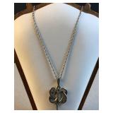Sterling silver necklace with woven pendant