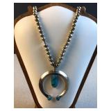 Turquoise and silver horseshoe necklace