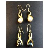 Gold toned swirl earrings white and dark pearls