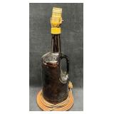 Large Glass Jug Lamp With A Wood Circle Base Large Glass Jug Lamp With A Wood Circle Base