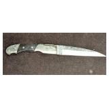 Damascus Steel Black Horn Handle Knife Retired A Damascus Steel Black Horn Handle Knife Retired A
