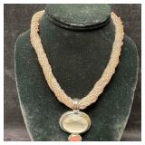 Twisted Pink Beaded Necklace with Faceted Glass an