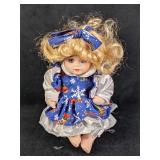 McField International Sitting Porcelain Doll