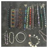 Lot of Sixteen Vintage and Handmade Beaded Charm B