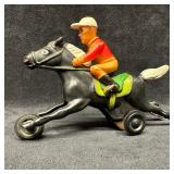 Vintage Horse and Jockey Rolling Toy Figure with W