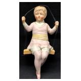Antique Porcelain Bisque Girl on Swing - Made in G