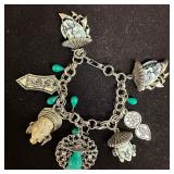 Asian Theme Charm Bracelet with Carved Figural Hea