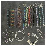 Lot of Sixteen Vintage and Handmade Beaded Charm B