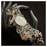 Sterling Silver Multi Charm Bracelet Articulated a