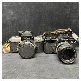 Pair of Vintage Nikon 35mm SLR Film Cameras With N