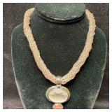 Twisted Pink Beaded Necklace with Faceted Glass an
