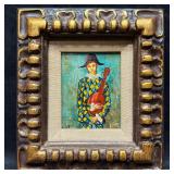 Framed Oil Painting of harlequin Musician Holding